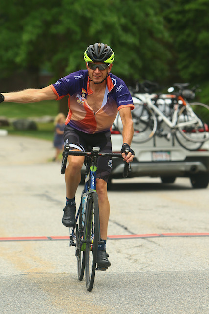 A person riding a bicycle
Description automatically generated