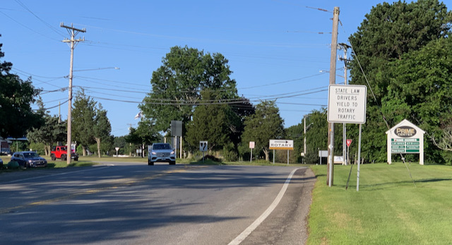A picture containing text, sky, outdoor, tree
Description automatically generated