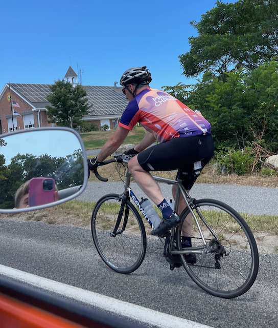 A person riding a bicycle
Description automatically generated with medium confidence